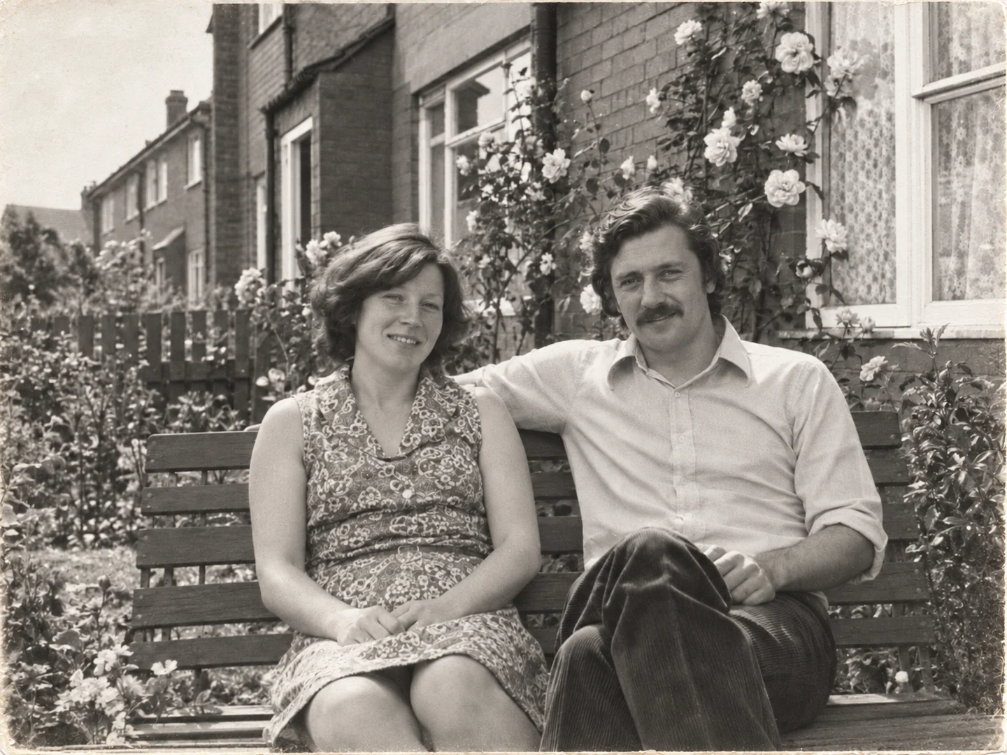 The same family snapshot with clearer tones and fewer surface marks